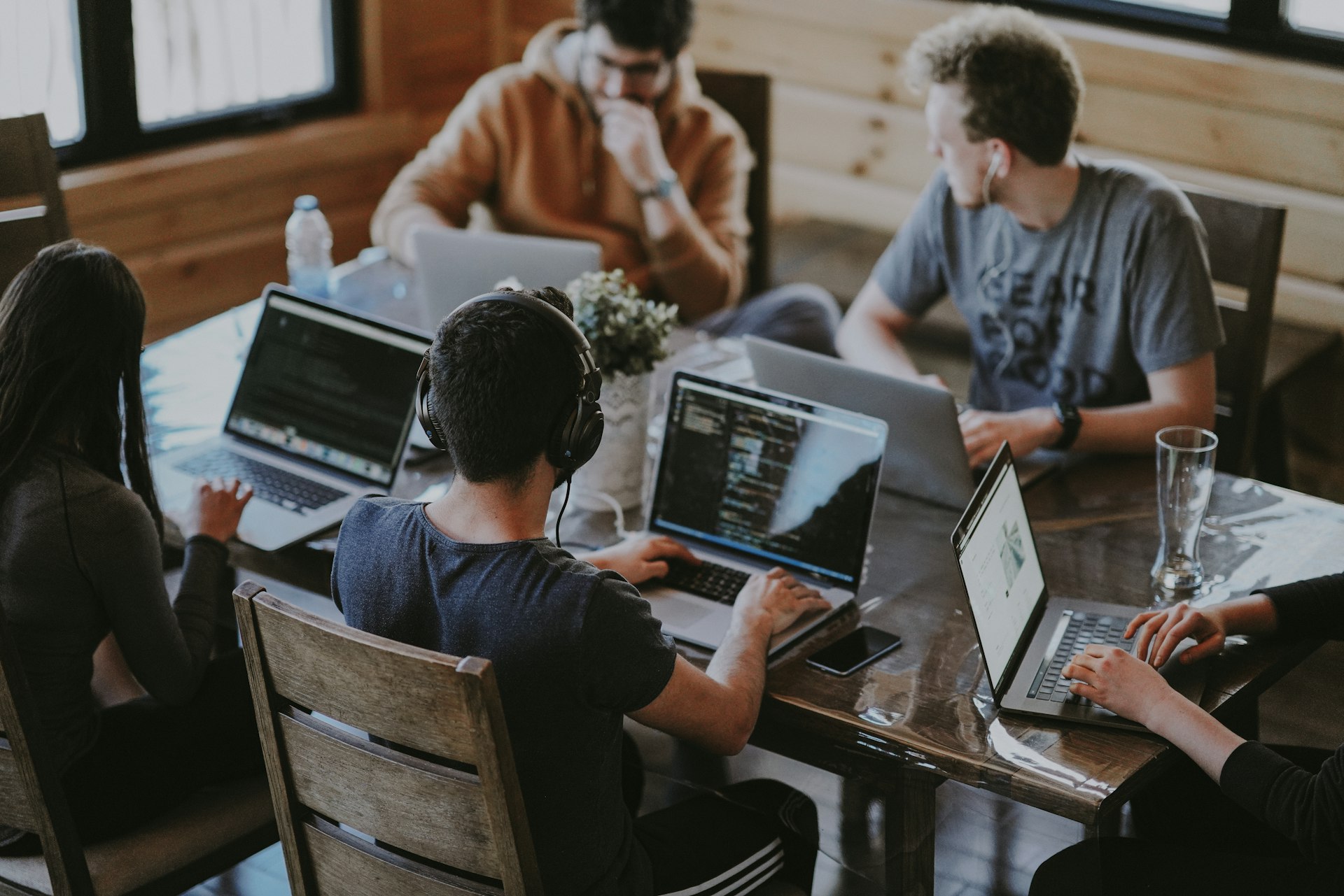 Professional software development team collaborating in a modern office